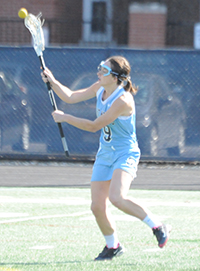 Clare Theisen scores the first goal of the game on Saturday.