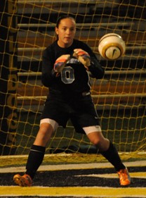 Chanler Rosenbaum makes one of her eight saves against Adrian on Thursday night.