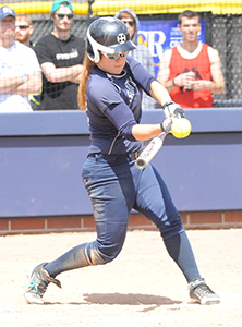 Kayla Chapman connects with her  go-ahead grand slam against Trine.