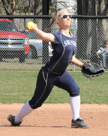 Emily Sherwood throws out a runner at first.