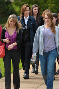 Weaver walks to lunch with students.