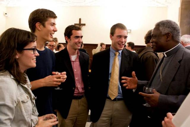 Students greet Cardinal Turkson