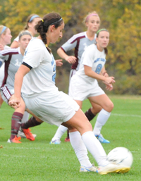 Mollie Valencia takes a free kick in the final nine minutes of play.