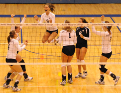 The Belles celebrate after the final point in their 3-2 win over Trine.