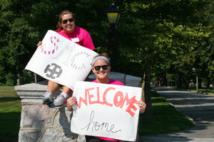Amy Tiberi '13, left, and Morgan Bedan '13 welcome new students to Saint Mary's College on Thursday. 