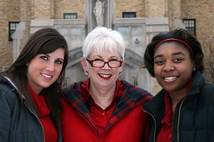 President Carol Mooney and students at Christmas