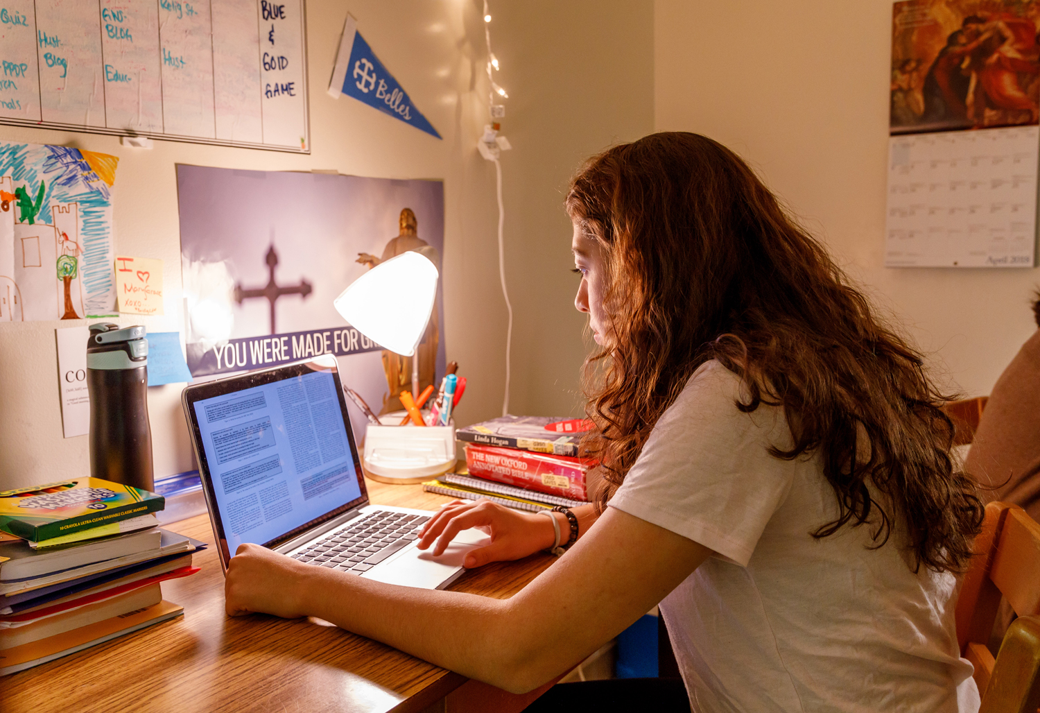 student studying at her computer