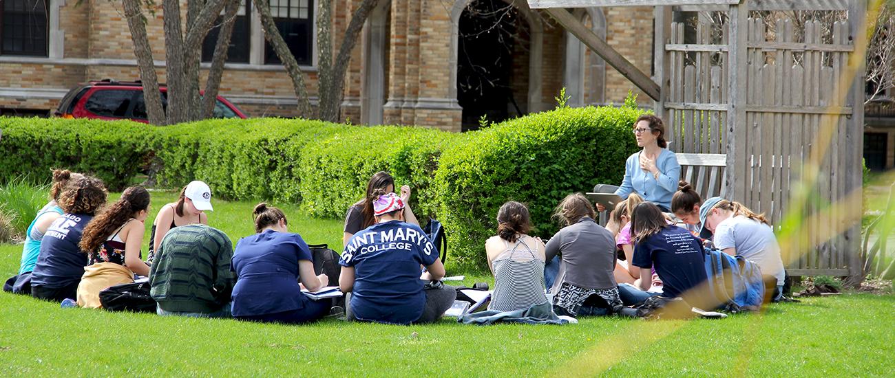 professor Anita Houck teaches class outside